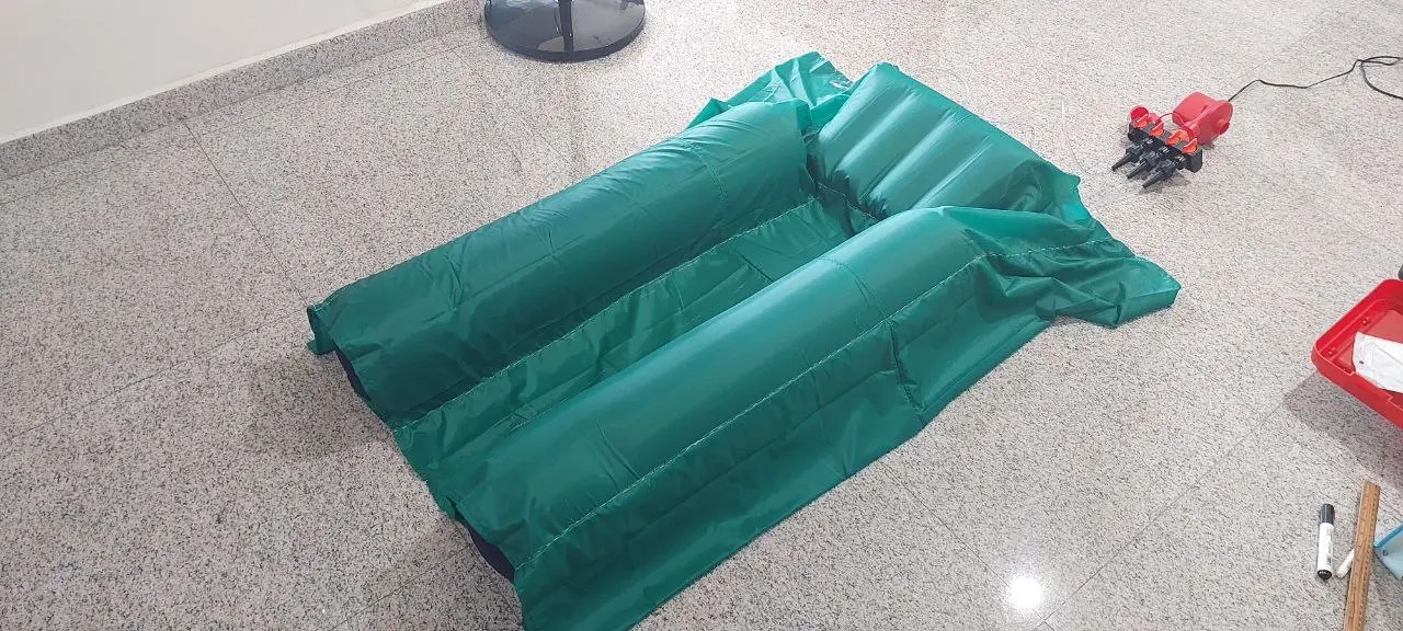 Completed green InflatAssist prototype with connected air valves
